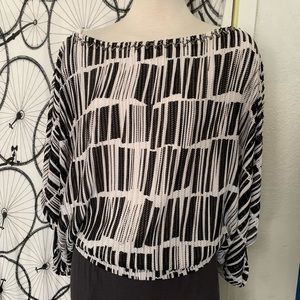 Alberto makali  tops